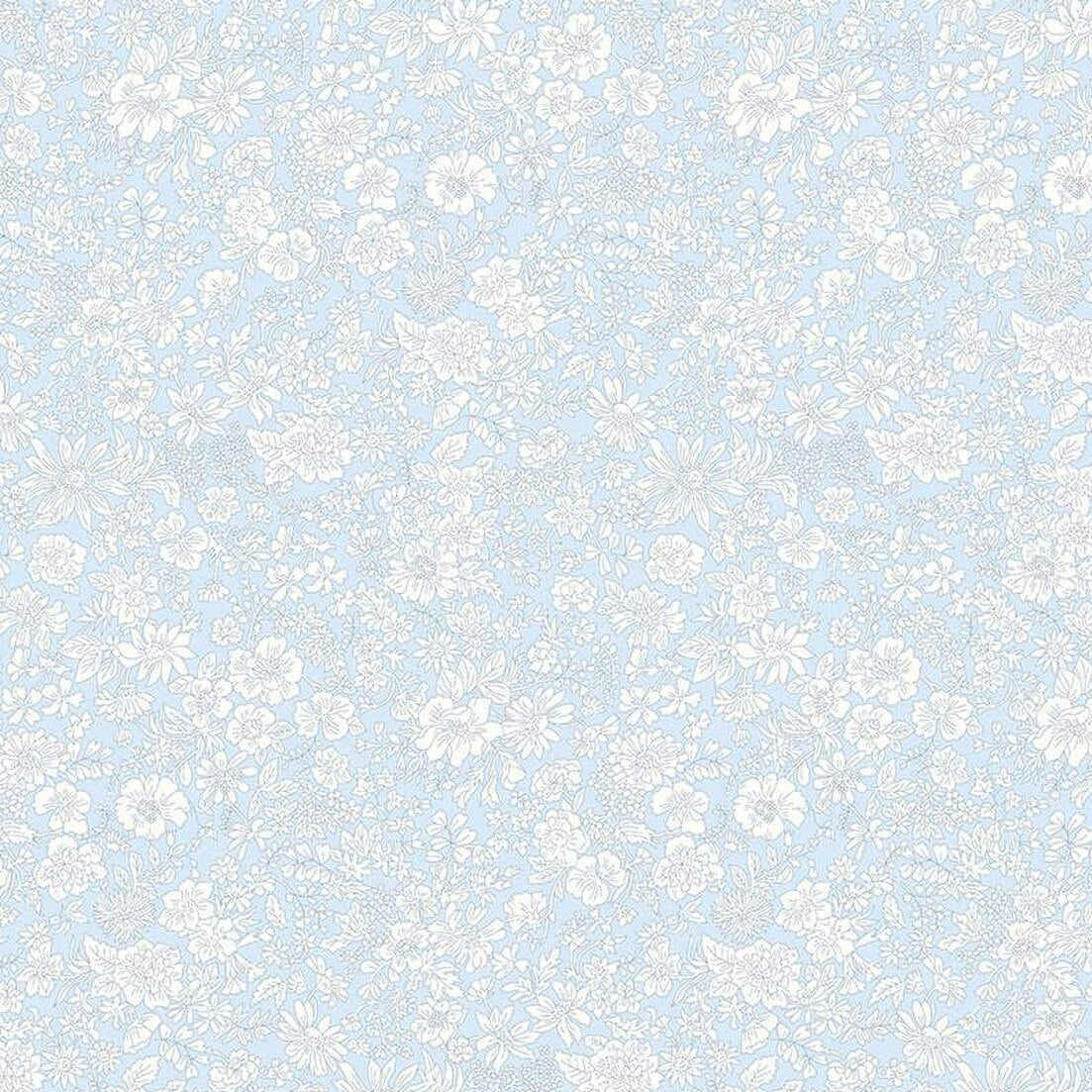 Pale blue cotton fabric with dense white floral outline print, Emily Belle by Liberty
