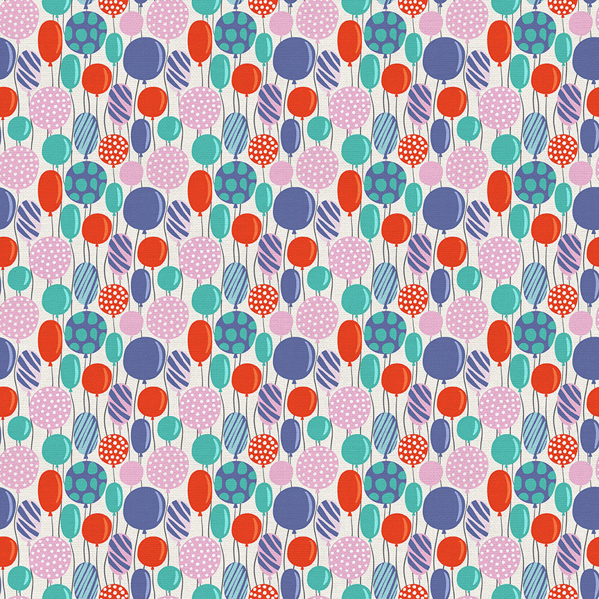 Colorful balloon print fabric in pink, red, teal, and blue on white background
