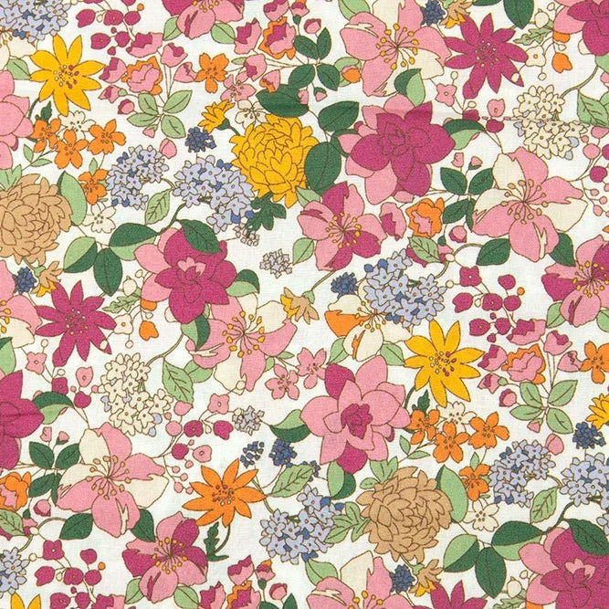 Poplin fabric with dense floral print in pink, magenta, yellow, orange, and blue on white