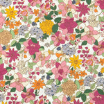 Poplin fabric with dense floral print in pink, magenta, yellow, orange, and blue on white