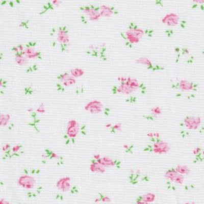 White cotton fabric with scattered small pink rose floral print and green leaves