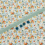 Floral cotton fabric with green gingham trim and four teal buttons for Georgia Dress Kit