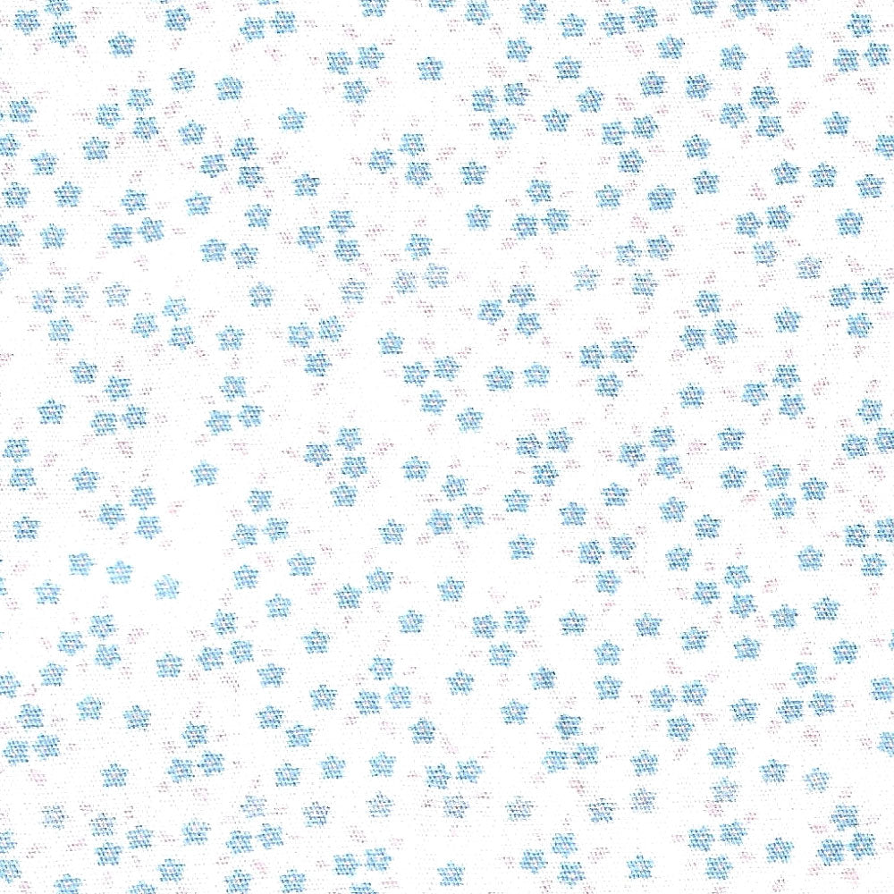 White cotton fabric with small scattered blue floral dot pattern throughout