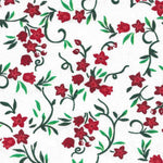 White cotton fabric with red floral and dark green vine print holiday pattern