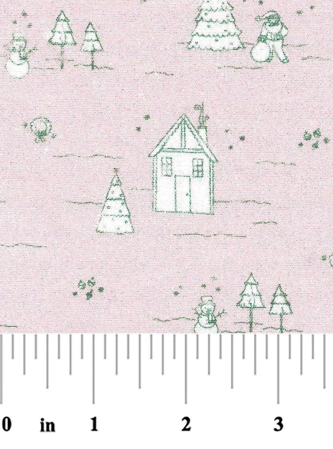 Pink cotton fabric with green toile winter scene of houses, snowmen, and pine trees.