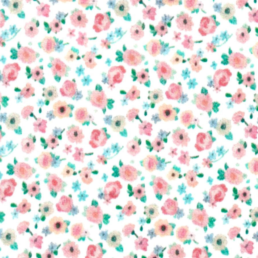 White cotton fabric with small pink rose and blue floral ditsy print pattern
