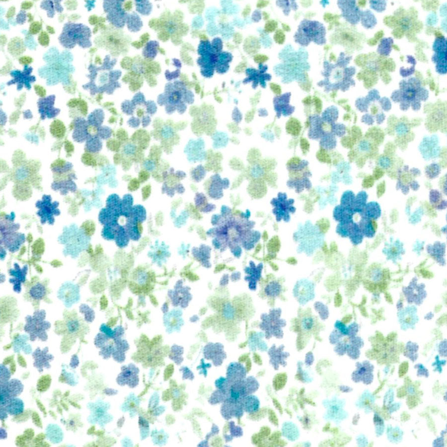 Blue and green ditsy floral print fabric on white background by Fabric Finders