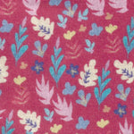 Raspberry red fabric with scattered multicolor hearts, leaves, and small floral motifs