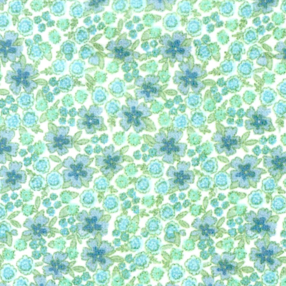 Blue and green floral fabric print featuring small flowers and leaves on white background