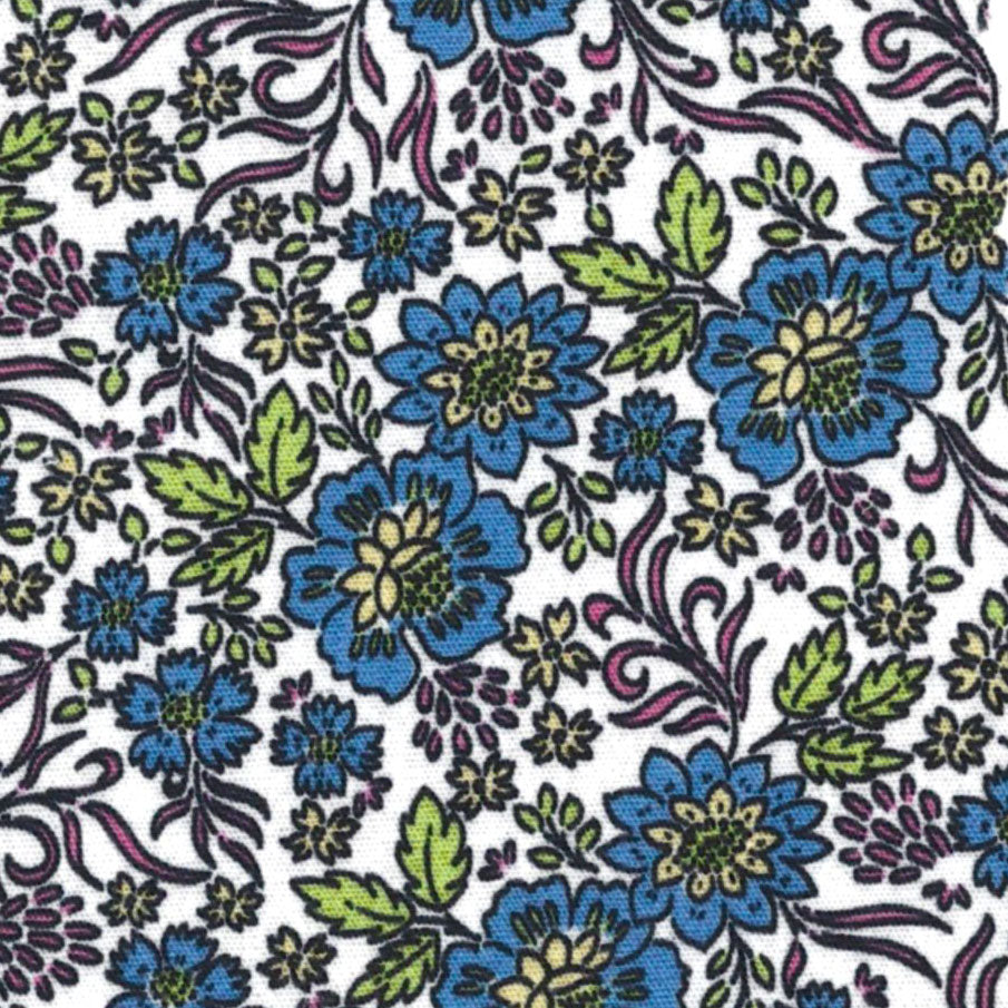 White cotton fabric with blue floral print, green leaves, and pink vine accents