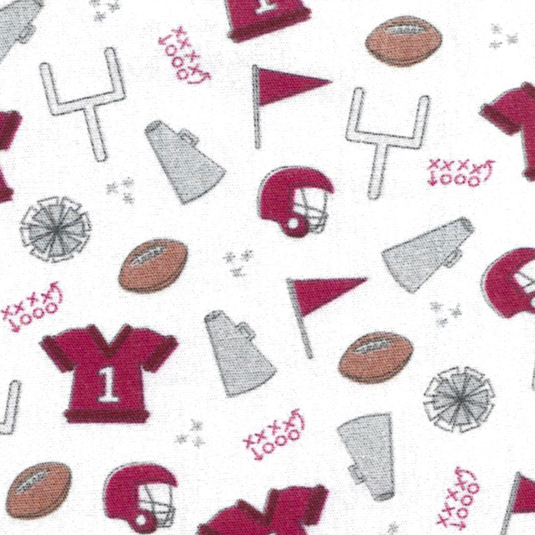 White fabric with crimson football helmets, jerseys, goal posts, and pom-poms pattern