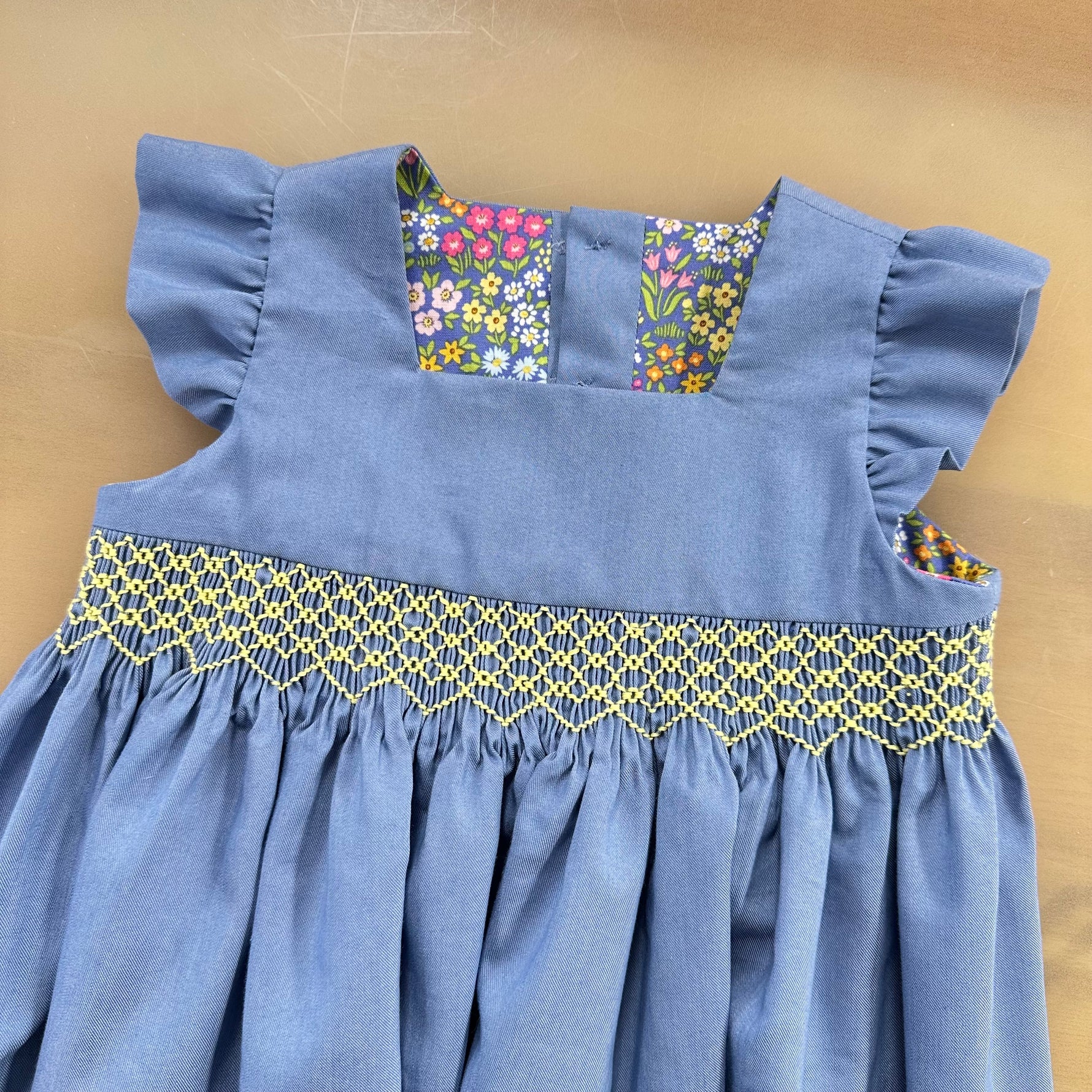 Smocked Blue dress with floral lining