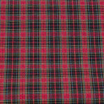 Red and black tartan plaid woven fabric with yellow and blue accent lines