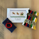Twas The Night smocking kit with DMC floss, navy dot fabric, red ribbon, and pattern
