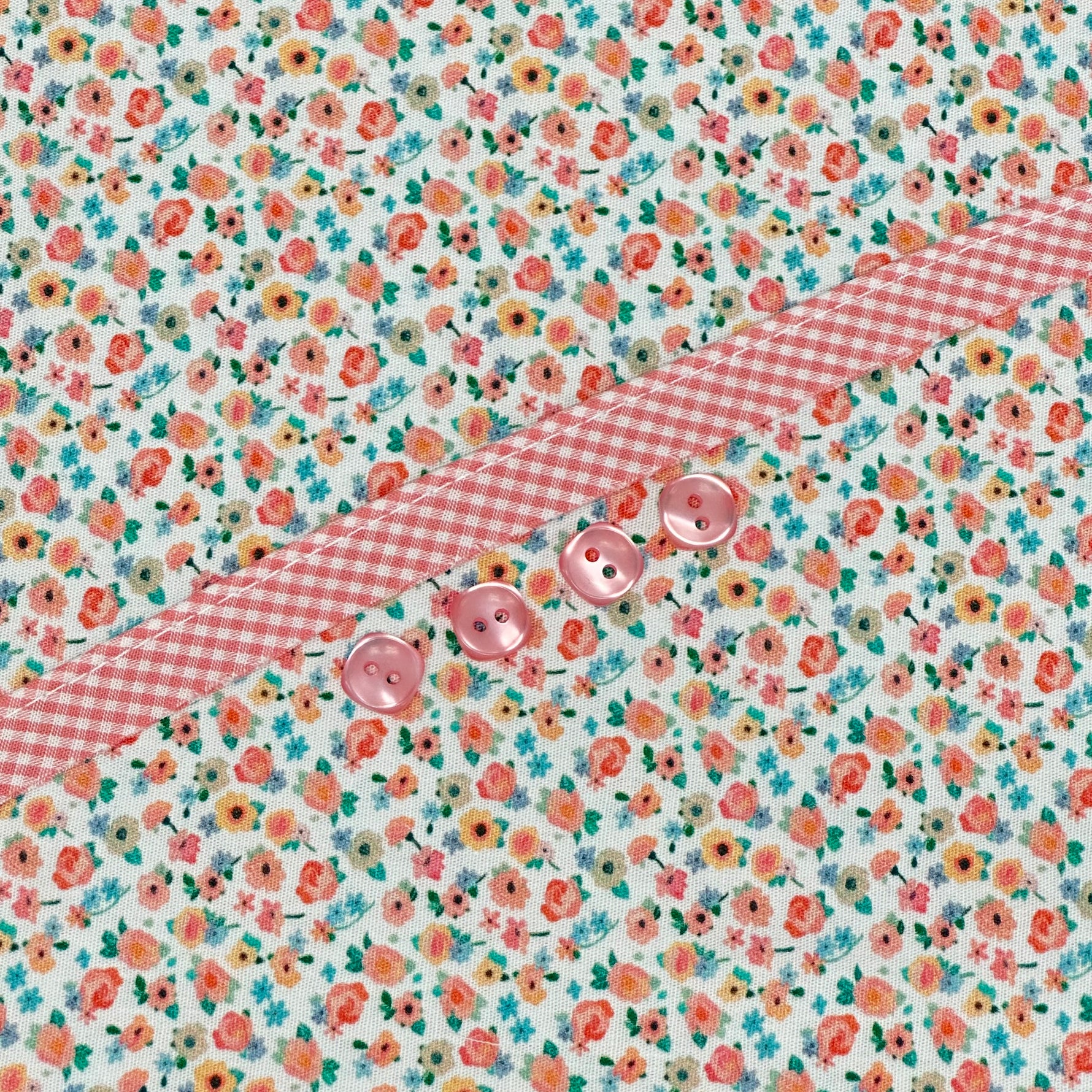 Floral ditsy print fabric with pink gingham trim and pink buttons for Georgia Dress Kit