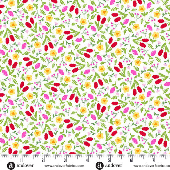 White cotton fabric with scattered red, yellow, and pink floral ditsy print and green leaves
