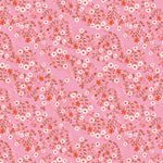 Pink cotton fabric with red and white small floral vines allover pattern