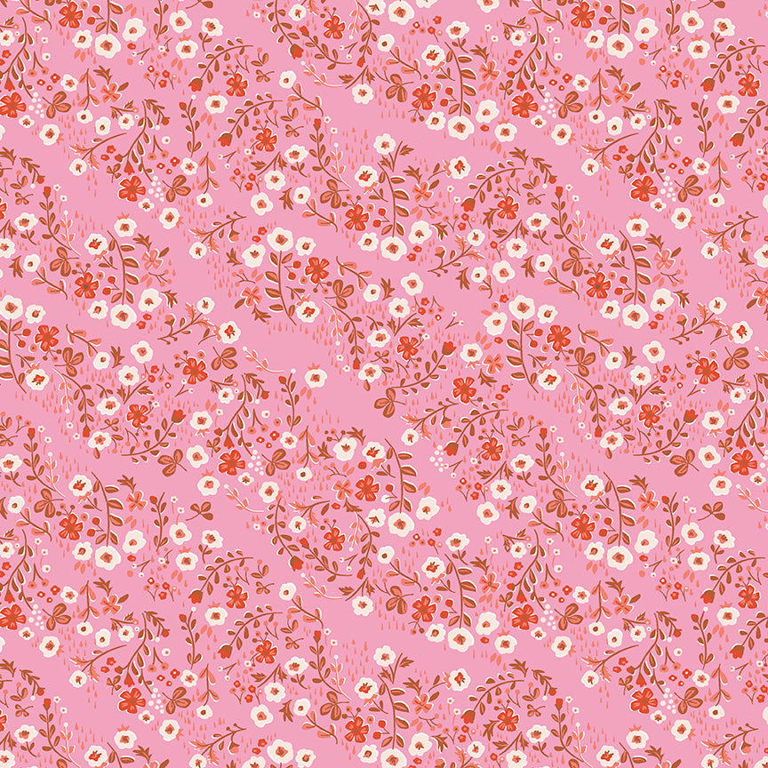 Pink cotton fabric with red and white small floral vines allover pattern
