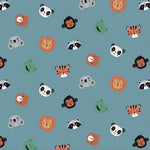Blue fabric with tossed cartoon animal faces: lions, pandas, tigers, monkeys, frogs, raccoons, bears