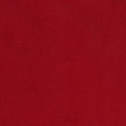 Solid crimson red corduroy fabric with smooth, uniform texture and rich color