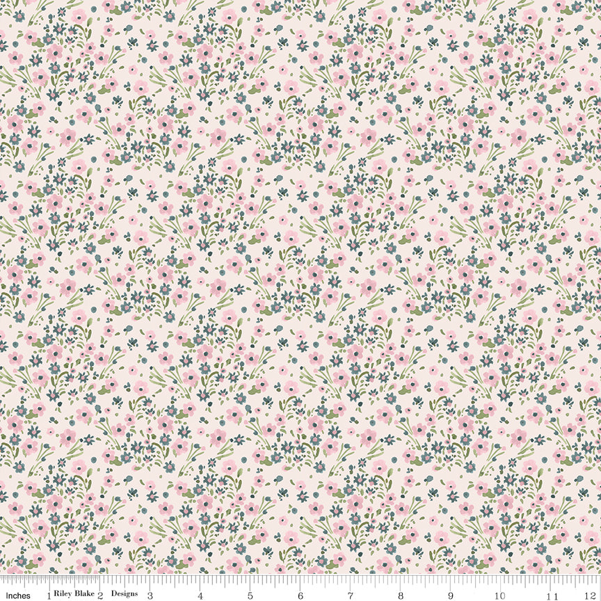 Cream quilting fabric with pink and blue scattered floral bouquet pattern by Riley Blake