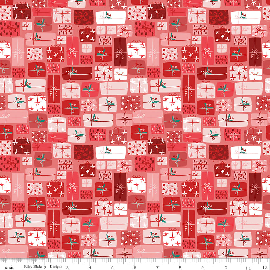 Berry red fabric with packed Christmas gift boxes in red, pink, and white tones