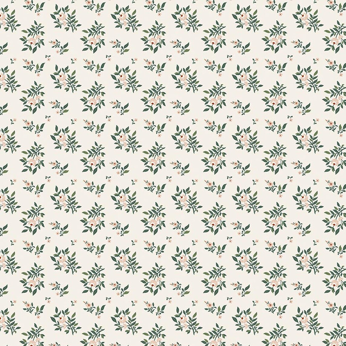 Cream fabric with small green leafy sprigs and pale pink floral clusters in repeat pattern.