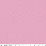 Pink quilting fabric with scattered small white pin dots, Riley Blake Pindots