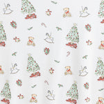 White knit fabric with scattered Christmas trees, teddy bears, rocking horses, and gifts pattern