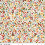 Cream quilting fabric with dense multicolor floral print in pink, yellow, and orange tones.