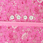 Pink floral fabric with gingham trim and four white buttons, Carol Dress Kit
