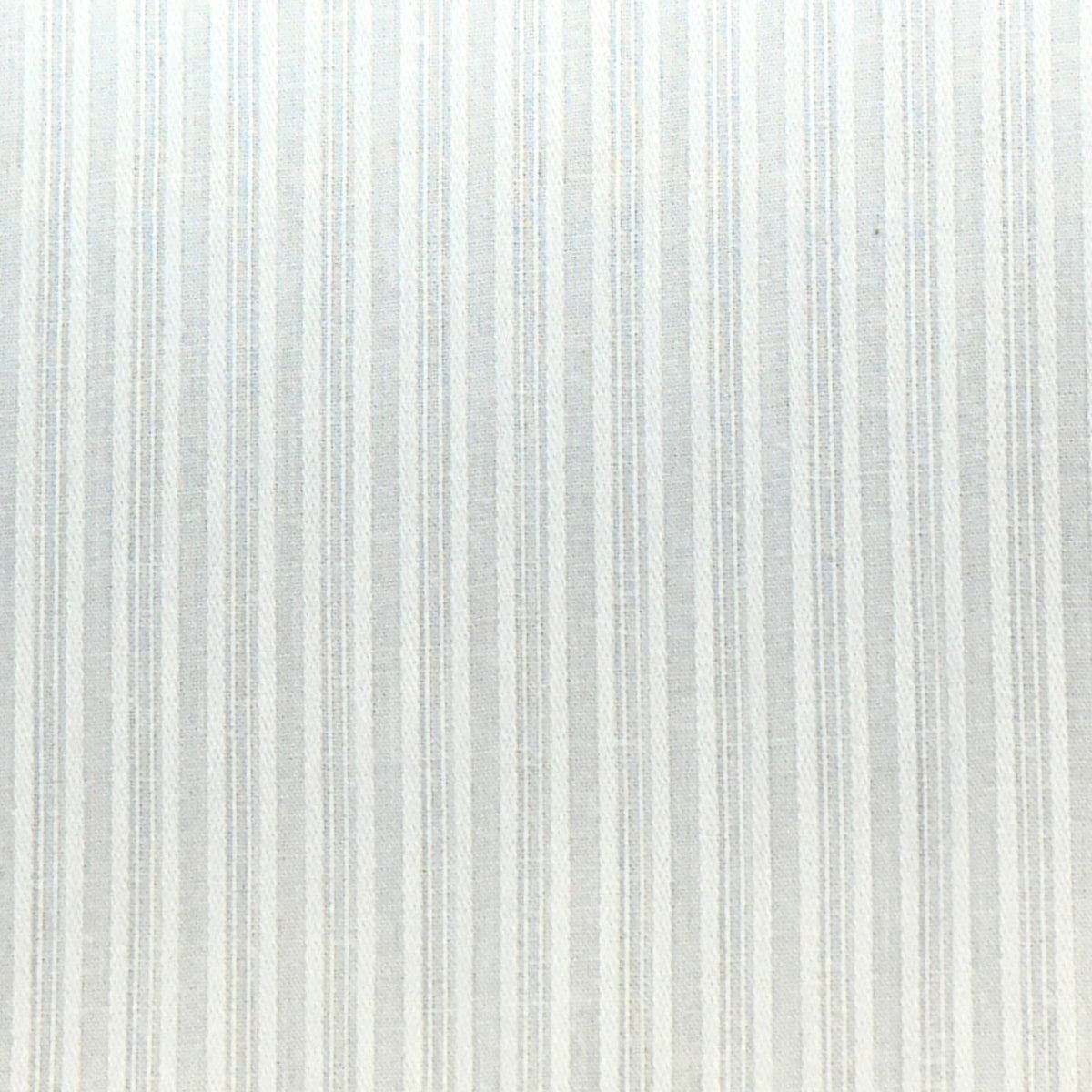 White Pima cotton fabric with subtle vertical pinstripes in pale blue and cream