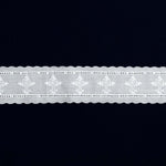White Swiss embroidered lace trim with cross motifs and scalloped edges