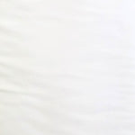 Smooth white broadcloth fabric with subtle drape and soft folds