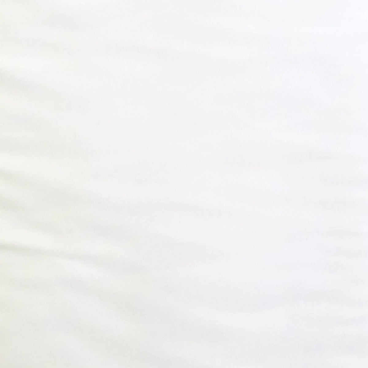 Smooth white broadcloth fabric with subtle drape and soft folds