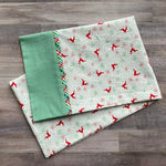 Christmas pillowcase kit with red reindeer snowflake print and green gingham cuff fabric