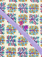 Floral fruit print fabric with purple gingham ribbon and two purple flower buttons