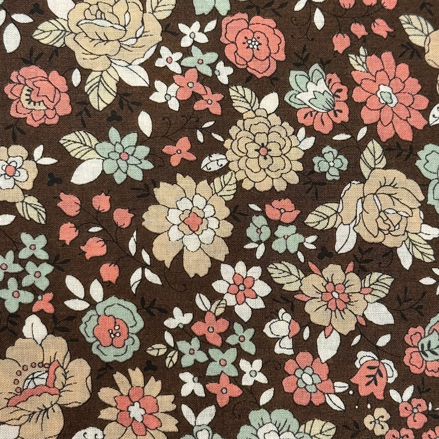 Yuwa brown cotton lawn fabric with pink, cream, and mint floral print