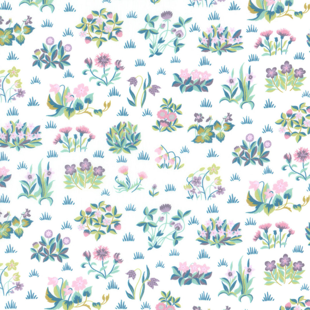 White cotton fabric with scattered pastel pink, purple, and teal wildflower bouquet clusters