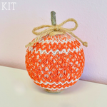Orange and white smocked pumpkin with twine bow and stem, fall decor kit