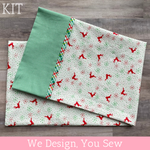 Christmas pillowcase kit with red reindeer print and green gingham fabric panels