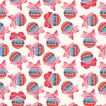 Repeating Christmas ornament fabric print with pink bows and Joy script on ivory