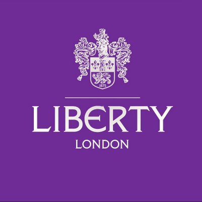 Liberty London purple logo with ornate crest, fabric brand identifier