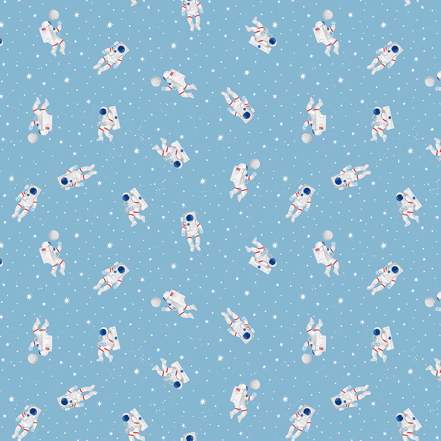 Sky blue fabric with white astronauts floating among stars and planets pattern