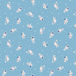Sky blue fabric with white astronauts floating among stars and planets pattern