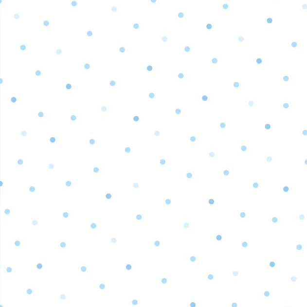 White flannel fabric with scattered tossed blue dots in varying shades and sizes