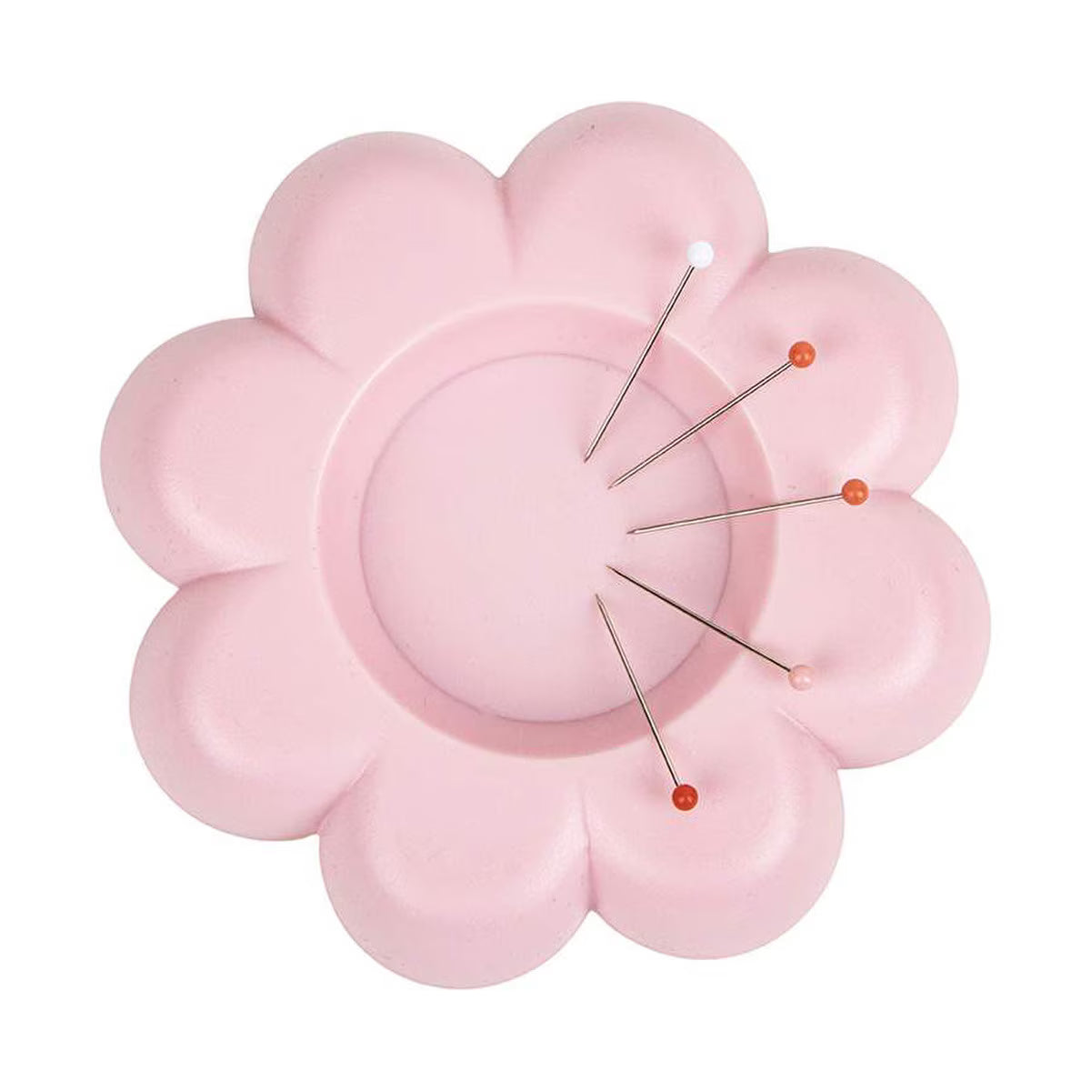 Pink flower-shaped magnetic pin holder with sewing pins, daisy petal design