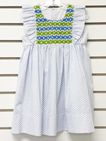Girl's white polka dot dress with blue and green smocked yoke and ruffle sleeves