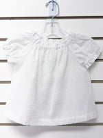 White swiss dot off-shoulder toddler tunic with puff sleeves, size 12 months