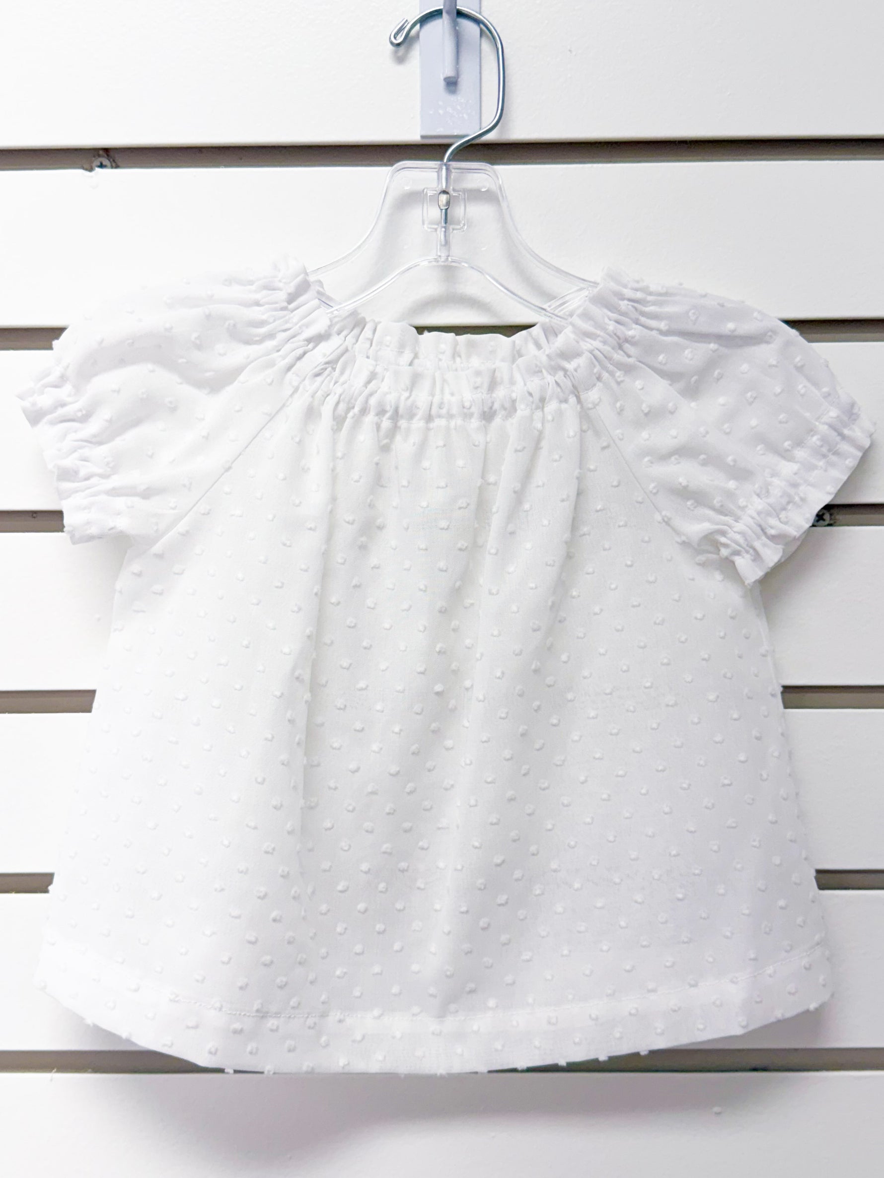 White swiss dot off-shoulder toddler tunic with puff sleeves, size 12 months